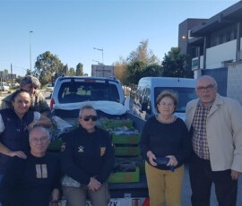 Entrega de alimentos en caritas y comedor social